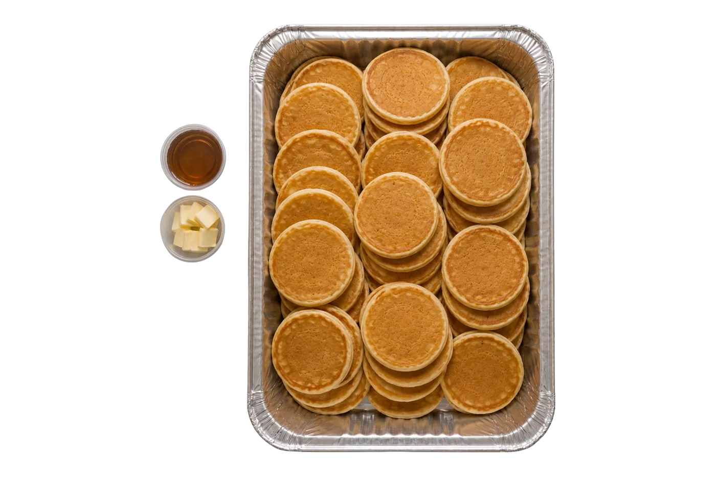 protein pancake catering tray — a foil pan of high-protein pancakes with syrup and butter cups, for minneapolis office breakfast catering